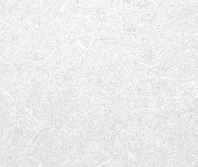 Laminate surface with a fine speckled grey pattern