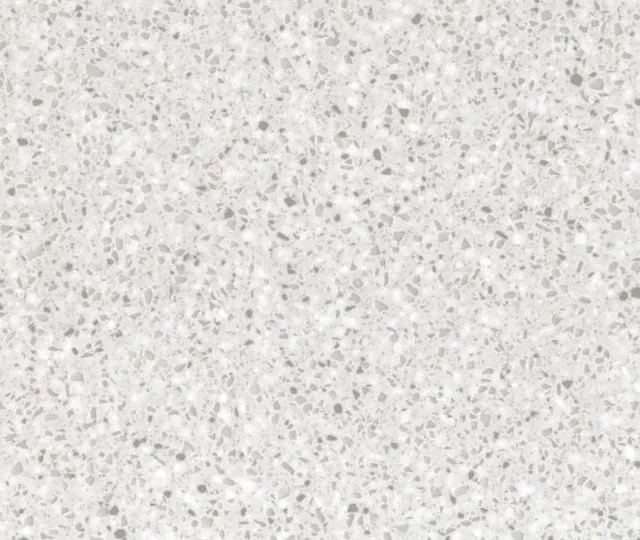 Solid surface material with a dense grey and white speckle