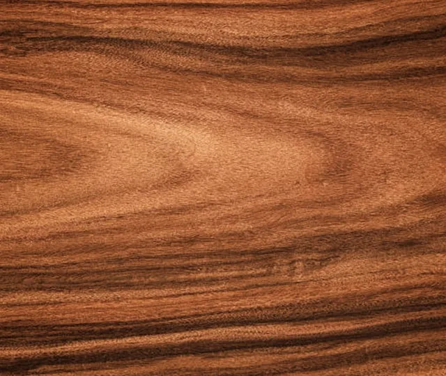 Wood surface with deep reddish brown grain